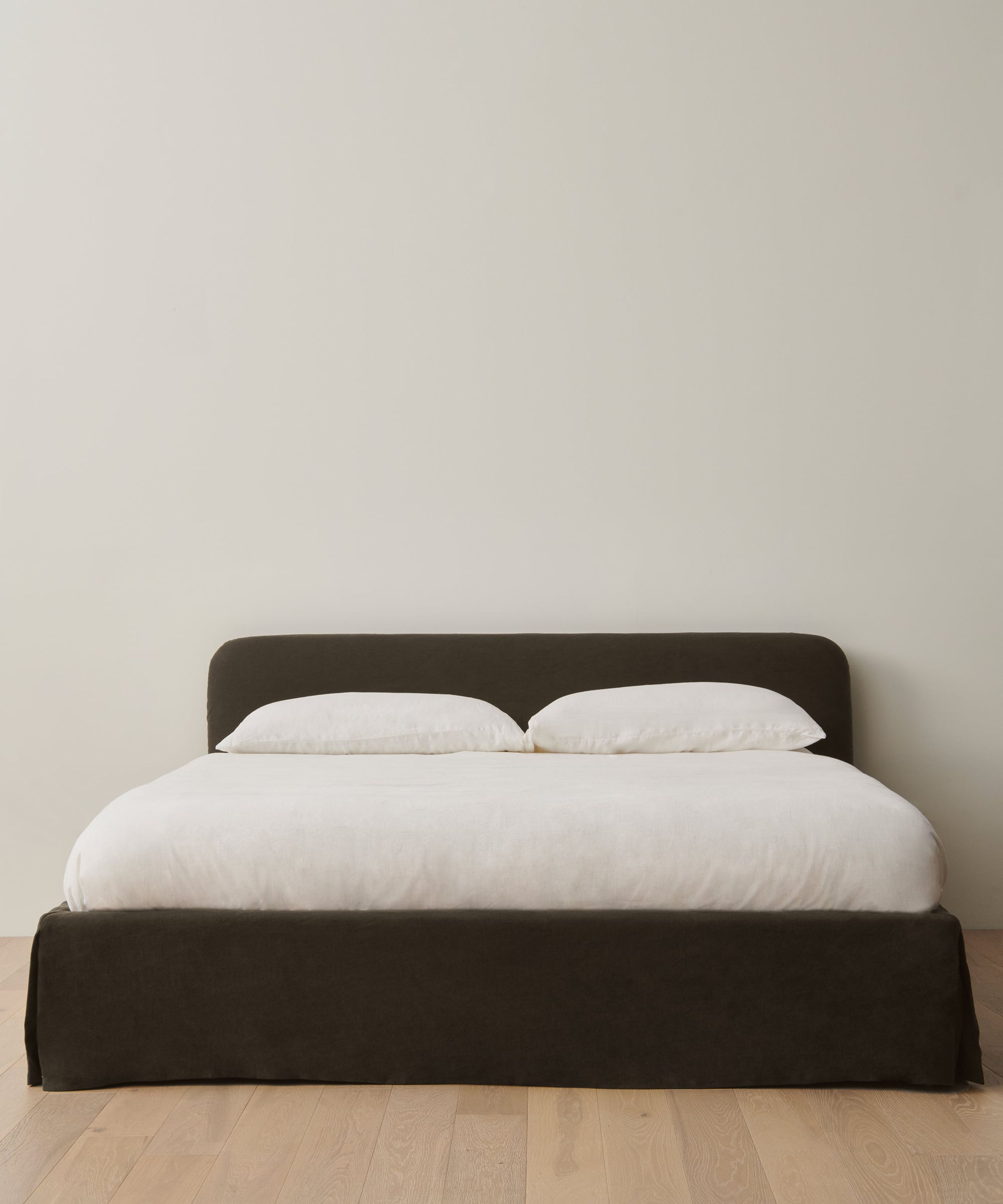 Luxury Upholstered Linen Cove Bed in Jet Linen | Jenni Kayne