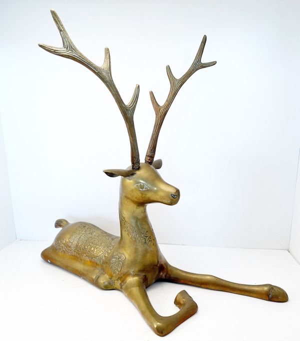 Large vintage brass deer with embossed filigree detail