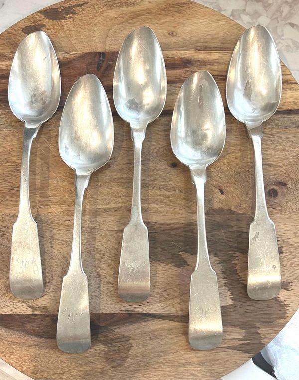 Antique coin silver spoons.