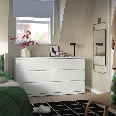 STORKLINTA Cómoda de 6 cajones - blanco/Función de anclaje/desbloqueo 140x48x75 cm